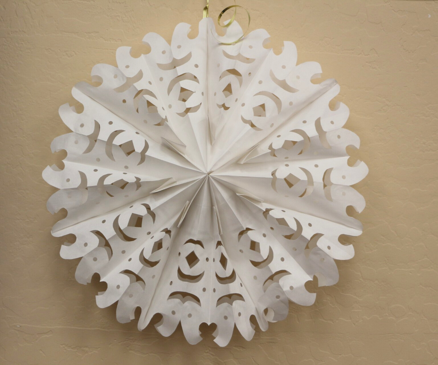 White bag cut into a snowflake shape