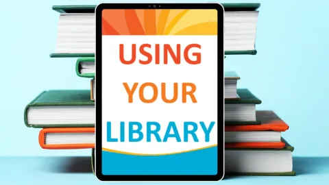 Stack of books with tablet with the text Using Your Library