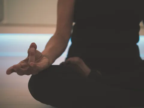 Person sitting in meditation